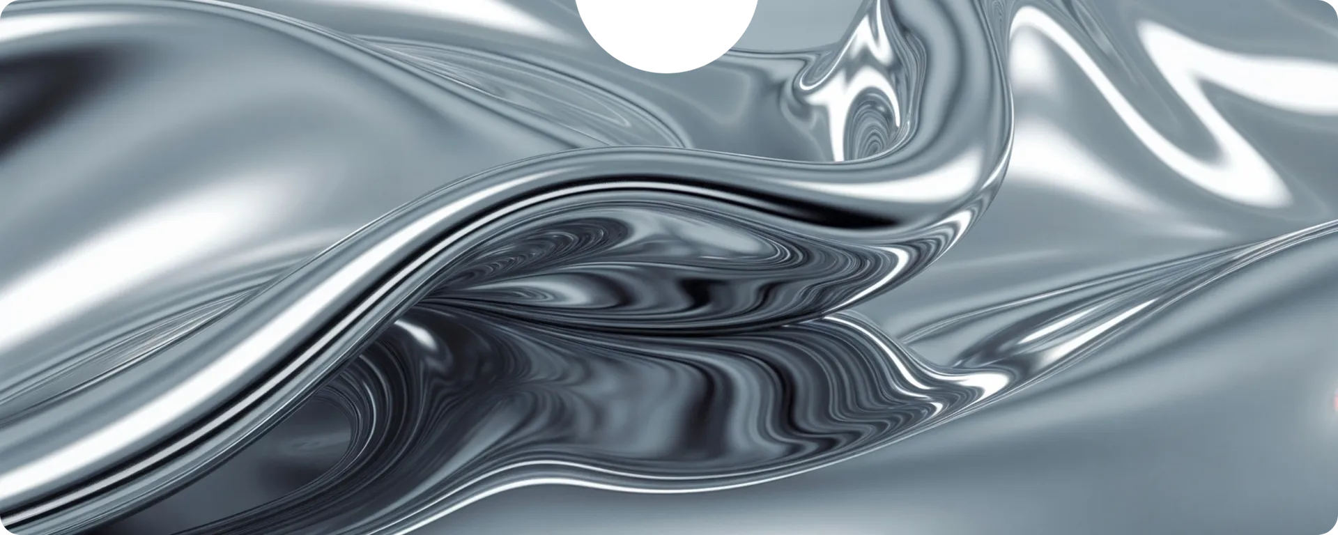 Texture of shiny, flowing silver fabric with waves.