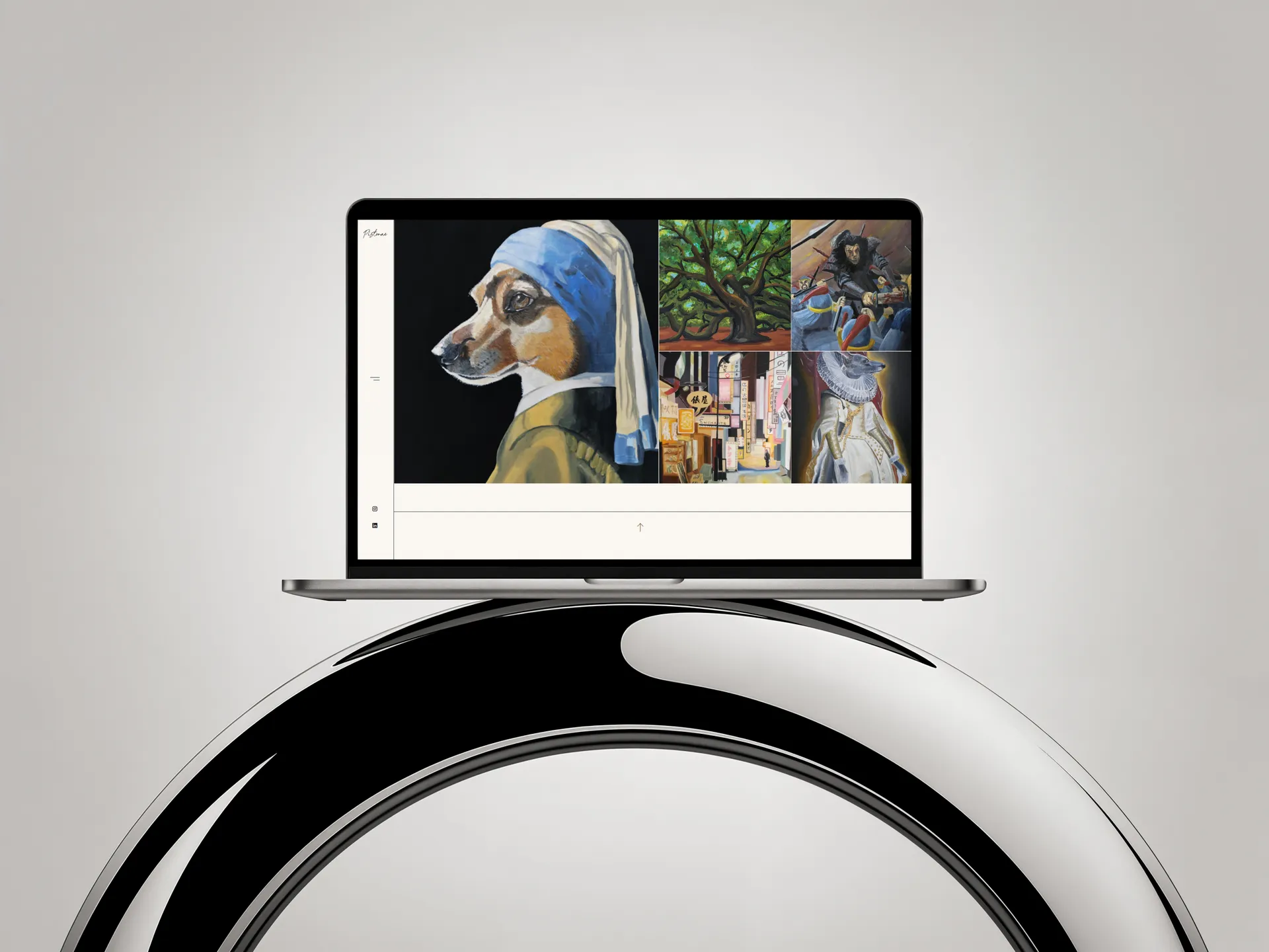 Ordinateur portable affichant des œuvres d'art sur un support rond.